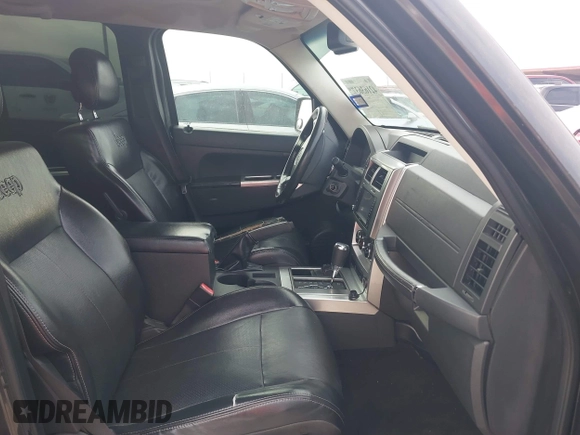 2010 Jeep Liberty Limited with VIN 1J4PN5GKXAW130705, listed as a IAAI auction lot 42163637 with 227,336 mi miles. Bid and sale history available at carsss.com. Image 5.