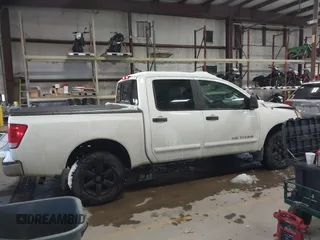 2014 Nissan Titan S with VIN 1N6AA0EC2EN512337, listed as a IAAI auction lot 41337837 with 187,540 mi miles and . Bid and sale history available at DreamBid. Image 13.