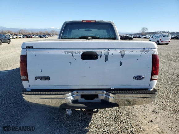 1997 Ford F-150 Standard with VIN 1FTDX1765VKA34301, listed as a Copart auction lot 88819225 with 130,173 mi miles and Salvage Title. Bid and sale history available at carsss.com. Image 6.