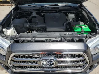 2017 Toyota Tacoma SR5 z VIN 3TMCZ5AN6HM060416, wystawiony jako Copart lot #56697175 z przebiegiem 120 029 mil mil oraz Szkoda całkowita • Salvage title. Historia ofert i sprzedaży dostępna na DreamBid. Obrazek 11.