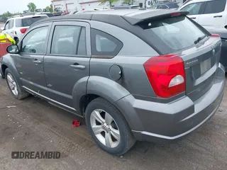 2012 Dodge Caliber SXT z VIN 1C3CDWDA6CD532023, wystawiony jako IAAI lot #42381719 z przebiegiem 210 000 mil mil oraz . Historia ofert i sprzedaży dostępna na DreamBid. Obrazek 3.