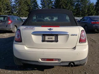 2012 MINI Convertible с VIN WMWZN3C52CT133828, выставлен на аукционе Copart как лот 89387935 с пробегом 106 567 миль миль и Списание • Salvage title. История ставок и продаж доступна на DreamBid. Изображение 6.