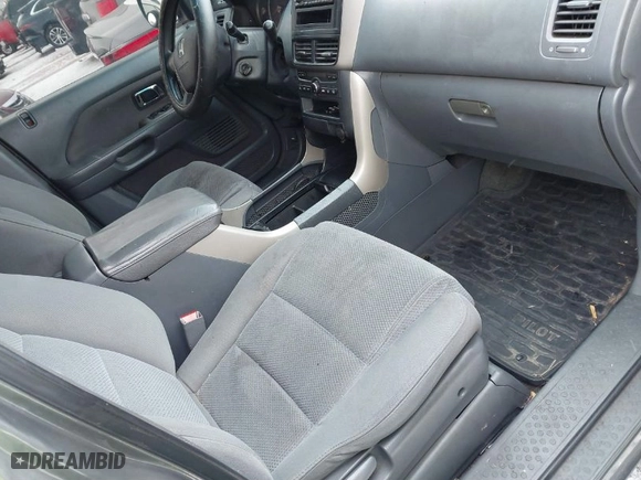 2007 Honda Pilot EX with VIN 2HKYF18427H513083, listed as a IAAI auction lot 41376346 with 301,841 mi miles. Bid and sale history available at carsss.com. Image 5.
