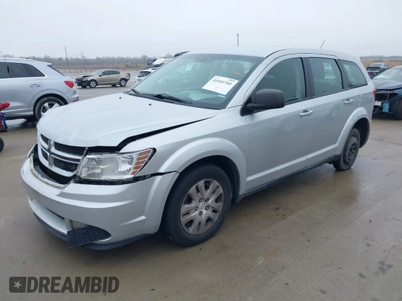 2014 Dodge Journey SE Plus with VIN 3C4PDCAB1ET181480, listed as a IAAI auction lot 41441341 with 189,641 mi miles and . Bid and sale history available at DreamBid. Image 2.