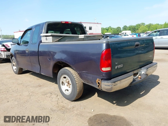 2000 Ford F-150 XL with VIN 1FTZX1723YNB00043, listed as a IAAI auction lot 42215601 with Not provided miles and . Bid and sale history available at DreamBid. Image 3.