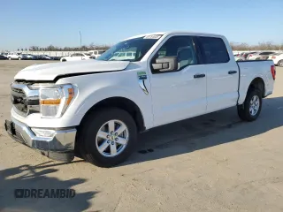 2021 Ford F-150 XL with VIN 1FTEW1CP8MFD11312, listed as a Copart auction lot 88754605 with 142,224 mi miles and Salvage title. Bid and sale history available at DreamBid. Image 1.