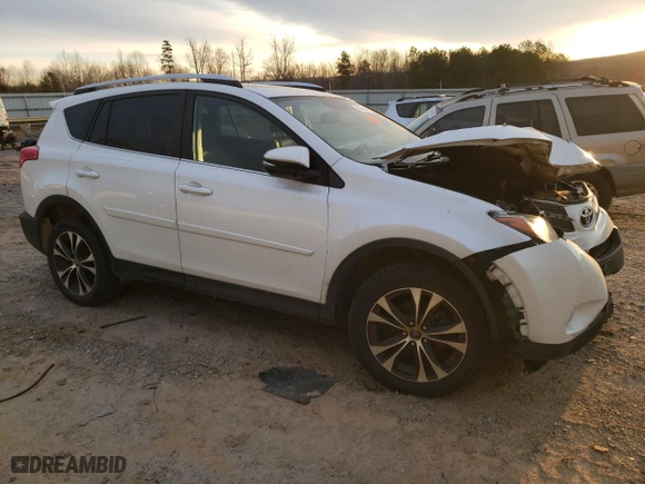 2015 Toyota RAV4 Limited with VIN 2T3DFREV0FW311571, listed as a Copart auction lot 44394355 with 214,563 mi miles and Salvage Title. Bid and sale history available at carsss.com. Image 4.