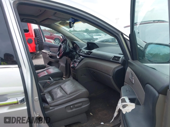 2011 Honda Odyssey Touring with VIN 5FNRL5H93BB071518, listed as a IAAI auction lot 42402421 with 227,647 mi miles and . Bid and sale history available at DreamBid. Image 5.
