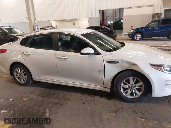2016 Kia Optima LX with VIN 5XXGT4L31GG046321, listed as a IAAI auction lot 41847730 with 88,439 mi miles. Bid and sale history available at carsss.com. Image 13.
