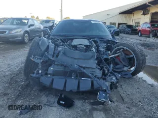 2014 Chevrolet Corvette Z51 2LT z VIN 1G1YJ2D78E5129092, wystawiony jako Copart lot #79669484 z przebiegiem 82 873 mil mil oraz Czysty tytuł • Clean title. Historia ofert i sprzedaży dostępna na DreamBid. Obrazek 5.