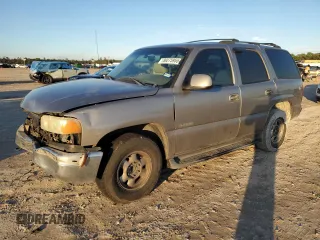 2002 GMC Yukon SLE z VIN 1GKEC13Z62R282497, wystawiony jako Copart lot #89275955 z przebiegiem 401 677 mil mil oraz Szkoda całkowita • Salvage title. Historia ofert i sprzedaży dostępna na DreamBid. Obrazek 1.