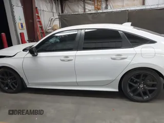 2023 Honda Civic Sport with VIN 2HGFE2F52PH531718, listed as a IAAI auction lot 42483695 with 21,781 mi miles and . Bid and sale history available at DreamBid. Image 14.
