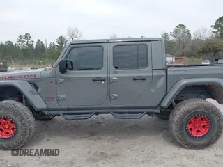 2021 Jeep Gladiator Rubicon with VIN 1C6JJTBG7ML554354, listed as a IAAI auction lot 41796943 with 61,513 mi miles and . Bid and sale history available at DreamBid. Image 15.