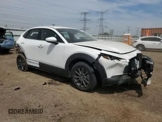 2023 Mazda CX-30 S with VIN 3MVDMBAMXPM586909, listed as a Copart auction lot 55889535 with 21,057 mi miles and Salvage title. Bid and sale history available at DreamBid. Image 4.