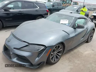 2021 Toyota Supra 2.0 with VIN WZ1DB2C0XMW038679, listed as a IAAI auction lot 42407988 with 76,316 mi miles and . Bid and sale history available at DreamBid. Image 2.