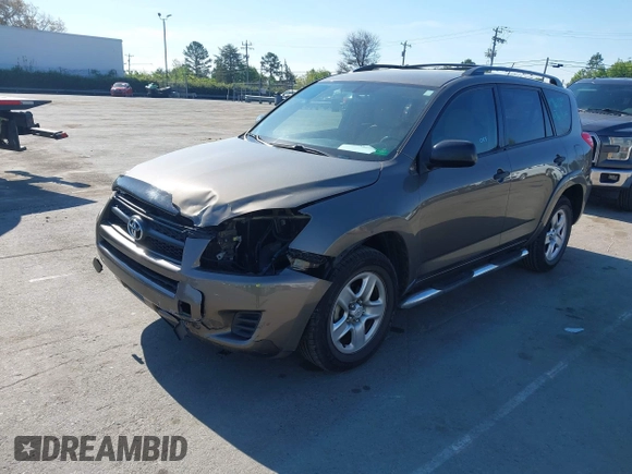 2009 Toyota RAV4 with VIN JTMZF33V395009905, listed as a IAAI auction lot 41881121 with 117,584 mi miles. Bid and sale history available at carsss.com. Image 2.