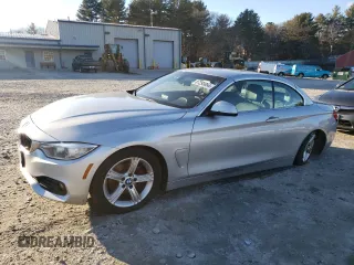 2014 BMW 4 Series 428i xDrive with VIN WBA3T1C51EPS98779, listed as a Copart auction lot 87293854 with 184,651 mi miles and Clean Title. Bid and sale history available at carsss.com. Image 1.