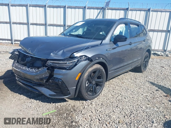 2024 Volkswagen Tiguan SE R-Line Black with VIN 3VVCB7AX2RM114556, listed as a IAAI auction lot 41887373 with 7,013 mi miles and . Bid and sale history available at DreamBid. Image 17.