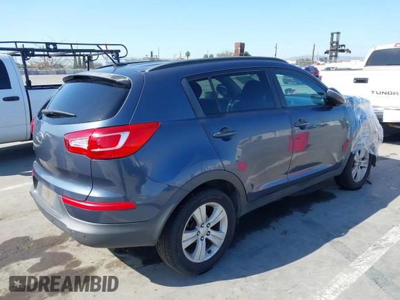 2011 Kia Sportage LX with VIN KNDPB3A23B7137650, listed as a IAAI auction lot 41979477 with 243,186 mi miles and . Bid and sale history available at carsss.com. Image 4.