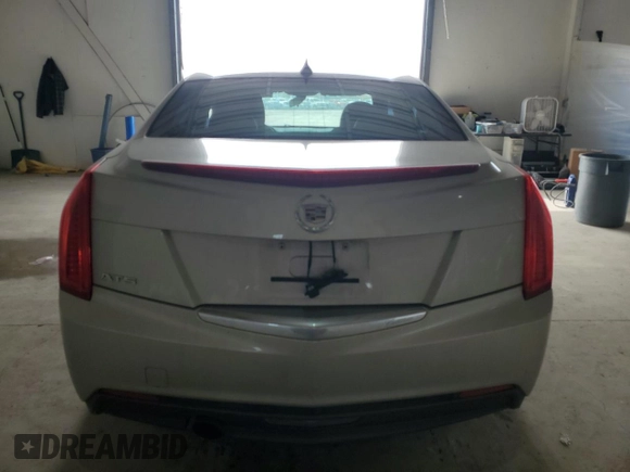 2014 Cadillac ATS Standard RWD z VIN 1G6AA5RA2E0101299, wystawiony jako Copart lot #49240615 z przebiegiem 165 498 mil mil oraz Szkody całkowita. Historia ofert i sprzedaży dostępna na DreamBid. Obrazek 6.