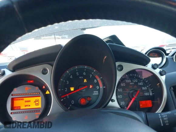 2016 Nissan 370Z with VIN JN1AZ4EH1GM933265, listed as a IAAI auction lot 41831484 with 98,193 mi miles. Bid and sale history available at carsss.com. Image 7.
