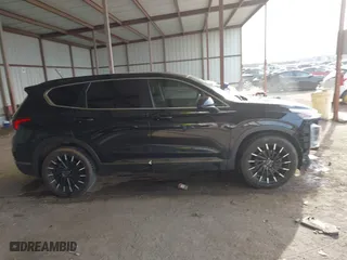 2019 Hyundai Santa Fe SE with VIN 5NMS23AD1KH112931, listed as a IAAI auction lot 41678592 with 96,477 mi miles. Bid and sale history available at carsss.com. Image 13.