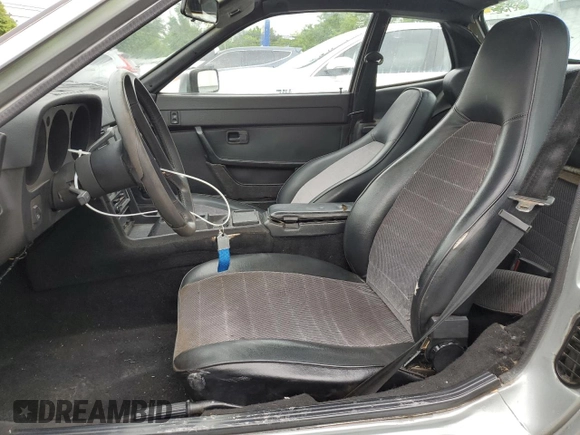 1983 Porsche 944 с VIN WP0AA0948DN453105, выставлен на аукционе Copart как лот 58870185 с пробегом 96 753 миль миль и Чистый • Clean title. История ставок и продаж доступна на DreamBid. Изображение 7.
