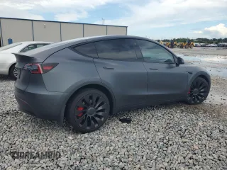 2022 Tesla Model Y Performance с VIN 7SAYGDEF0NF497582, выставлен на аукционе Copart как лот 65131685 с пробегом 50 948 миль миль и Чистый • Clean title. История ставок и продаж доступна на DreamBid. Изображение 3.