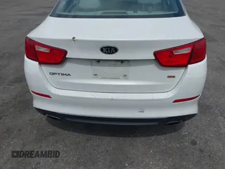 2015 Kia Optima LX with VIN 5XXGM4A71FG504439, listed as a IAAI auction lot 42470149 with 142,076 mi miles and . Bid and sale history available at DreamBid. Image 14.