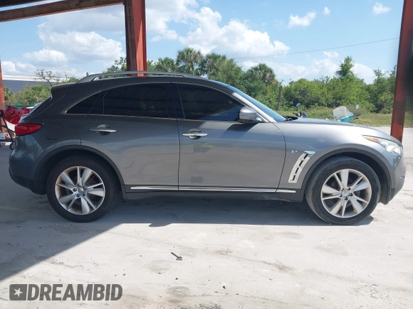 2016 Infiniti QX70 with VIN JN8CS1MU9GM671314, listed as a IAAI auction lot 42015268 with 122,850 mi miles and . Bid and sale history available at DreamBid. Image 13.