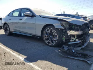 2024 BMW i5 eDrive40 with VIN WBY33FK01RCN99702, listed as a Copart auction lot 78737934 with 11,889 mi miles and Salvage Title. Bid and sale history available at carsss.com. Image 4.