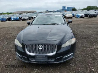 2013 Jaguar XJ с VIN SAJWJ1CD8D8V52463, выставлен на аукционе Copart как лот 61772115 с пробегом 123 899 миль миль и Чистый • Clean title. История ставок и продаж доступна на DreamBid. Изображение 5.