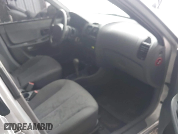 2005 Hyundai Accent GLS with VIN KMHCG45C75U656548, listed as a IAAI auction lot 41553603 with 178,070 mi miles. Bid and sale history available at carsss.com. Image 5.
