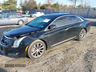 2013 Cadillac XTS z VIN 2G61N5S32D9238652, wystawiony jako IAAI lot #40966692 z przebiegiem 90 834 mil mil oraz . Historia ofert i sprzedaży dostępna na DreamBid. Obrazek 2.