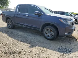2023 Honda Ridgeline RTL-E с VIN 5FPYK3F74PB023755, выставлен на аукционе Copart как лот 51540665 с пробегом 26 304 миль миль и Списание • Salvage title. История ставок и продаж доступна на DreamBid. Изображение 4.
