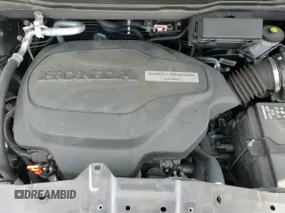 2020 Honda Pilot EX-L z VIN 5FNYF6H5XLB064394, wystawiony jako Copart lot #84211835 z przebiegiem 49 157 mil mil oraz Szkoda całkowita • Salvage title. Historia ofert i sprzedaży dostępna na DreamBid. Obrazek 14.