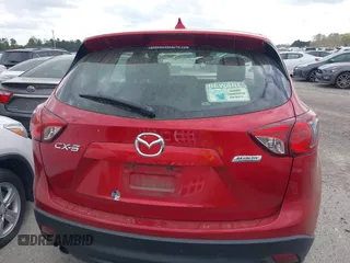 2016 Mazda CX-5 Sport with VIN JM3KE2BY9G0911535, listed as a IAAI auction lot 41906402 with 134,477 mi miles. Bid and sale history available at carsss.com. Image 17.
