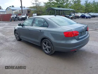 2013 Volkswagen Jetta SE with VIN 3VWBP7AJ2DM395982, listed as a IAAI auction lot 41952654 with 130,906 mi miles and . Bid and sale history available at DreamBid. Image 3.