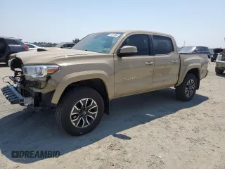 2020 Toyota Tacoma SR5 with VIN 3TMCZ5AN1LM318866, listed as a Copart auction lot 64521665 with 70,014 mi miles and Clean title. Bid and sale history available at DreamBid. Image 1.