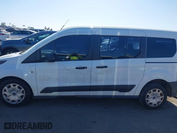 2015 Ford Transit Connect XL z VIN NM0GE9E74F1175703, wystawiony jako IAAI lot #42335351 z przebiegiem 416 622 mil mil oraz . Historia ofert i sprzedaży dostępna na DreamBid. Obrazek 14.