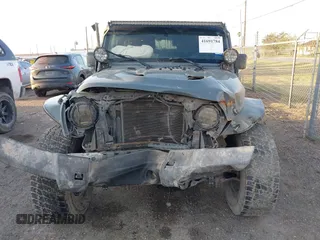 2014 Jeep Wrangler Sport with VIN 1C4AJWAG0EL326774, listed as a IAAI auction lot 41691784 with 98,696 mi miles and . Bid and sale history available at DreamBid. Image 13.