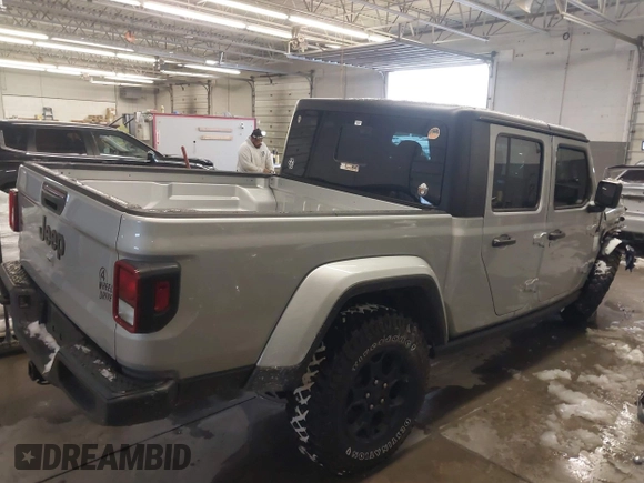2023 Jeep Gladiator Sport S с VIN 1C6HJTAG1PL558131, выставлен на аукционе IAAI как лот 41252271 с пробегом 42 582 миль миль и . История ставок и продаж доступна на DreamBid. Изображение 4.