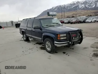 1999 GMC Suburban z VIN 1GDFK16R9XJ771458, wystawiony jako Copart lot #43412175 z przebiegiem 159 328 mil mil oraz Szkody całkowita. Historia ofert i sprzedaży dostępna na DreamBid. Obrazek 11.