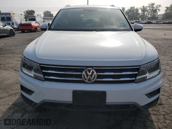 2018 Volkswagen Tiguan SEL z VIN 3VV3B7AX8JM208087, wystawiony jako Copart lot #59563715 z przebiegiem 79 863 mil mil oraz Szkoda całkowita • Salvage title. Historia ofert i sprzedaży dostępna na DreamBid. Obrazek 5.