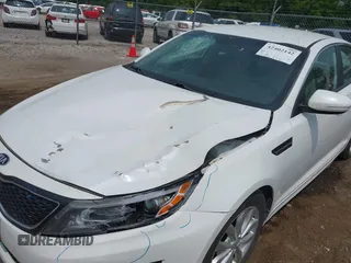 2015 Kia Optima LX with VIN 5XXGM4A71FG356034, listed as a IAAI auction lot 42402142 with 131,376 mi miles and . Bid and sale history available at DreamBid. Image 13.