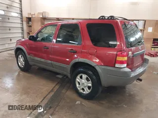 2001 Ford Escape XLT with VIN 1FMYU04101KF46809, listed as a IAAI auction lot 41664202 with 256,468 mi miles. Bid and sale history available at carsss.com. Image 3.