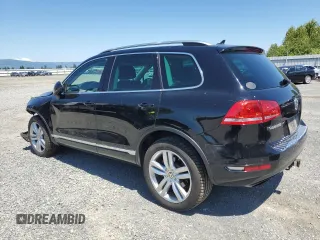 2013 Volkswagen Touareg Lux with VIN WVGEF9BP0DD001565, listed as a Copart auction lot 63070845 with 123,788 mi miles and Salvage title. Bid and sale history available at DreamBid. Image 2.