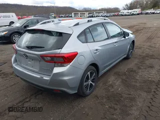 2023 Subaru Impreza Premium with VIN 4S3GTAV6XP3703123, listed as a IAAI auction lot 42018724 with 80,610 mi miles and . Bid and sale history available at DreamBid. Image 4.