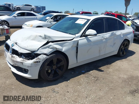 2014 BMW 3 Series 328i with VIN WBA3A5G55ENP31569, listed as a IAAI auction lot 42218428 with 151,927 mi miles and . Bid and sale history available at DreamBid. Image 2.