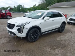 2022 Cadillac XT4 AWD Premium Luxury z VIN 1GYFZDR42NF128199, wystawiony jako IAAI lot #42522314 z przebiegiem 29 002 mil mil oraz . Historia ofert i sprzedaży dostępna na DreamBid. Obrazek 19.
